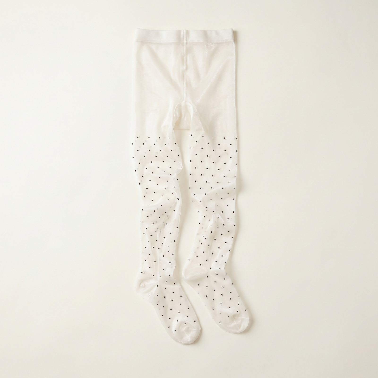 Doll Tights — White Polka flat-lay