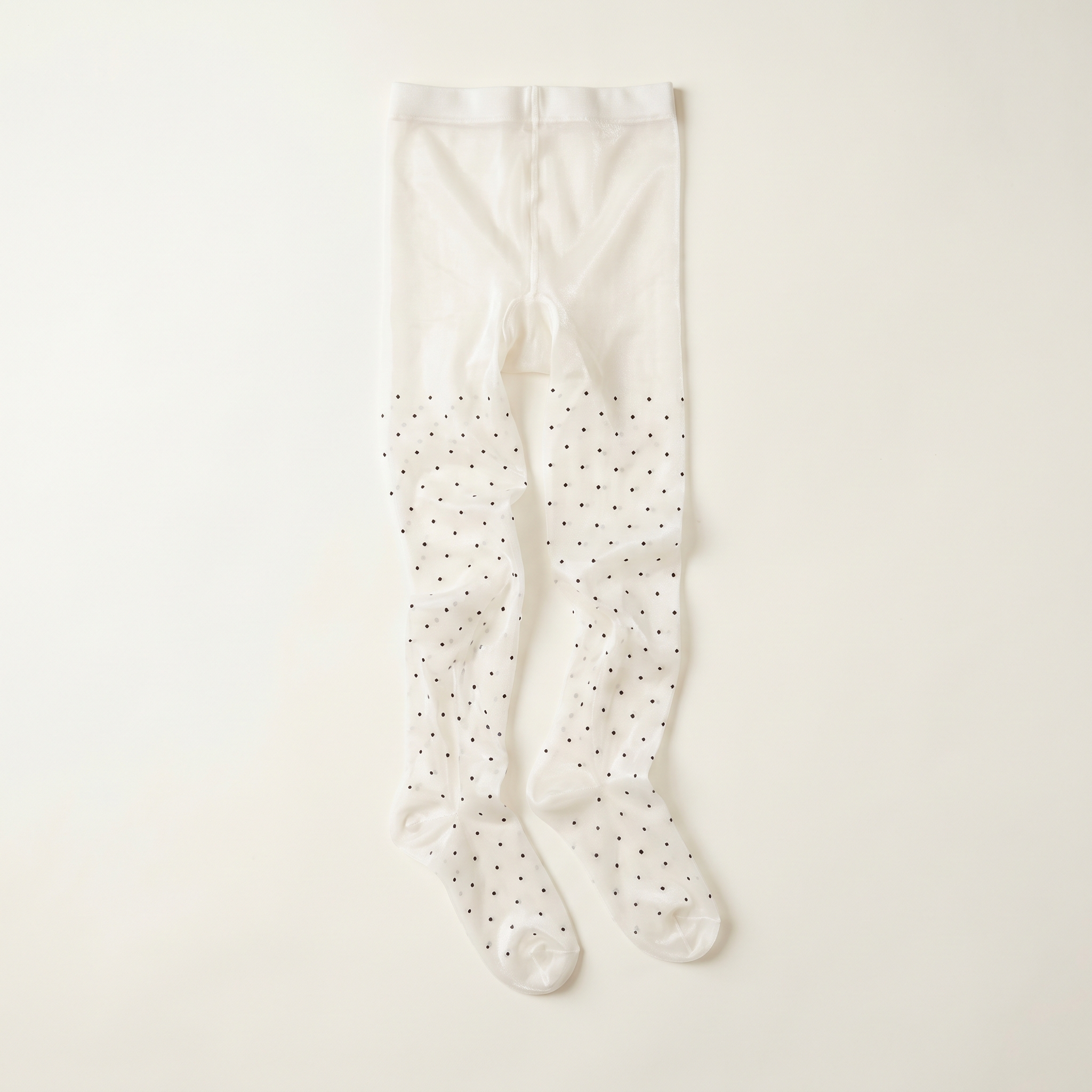 Doll Tights — White Polka flat-lay