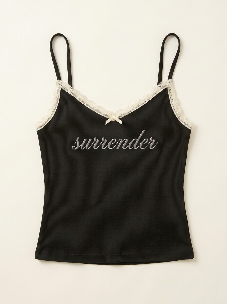 Surrender Cami — Black flat-lay